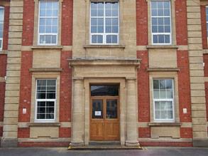 School building overcoated with Belzona 5122 (Clear Cladding Concentrate)