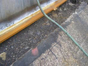 Tank base seal failure, allowing water ingress