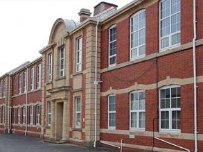 School building’s wall restored and protected with Belzona 5122 (Clear Cladding Concentrate)